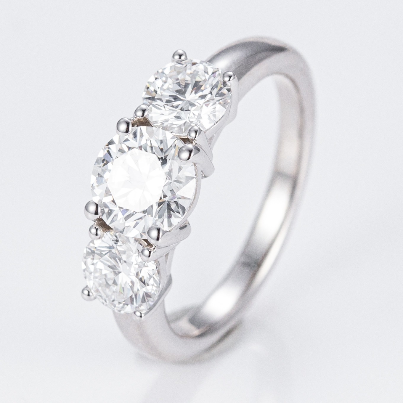 Trilogy Round Diamond Ring